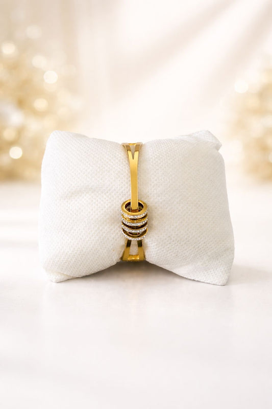 Bracelet à motifs en acier inoxydable doré